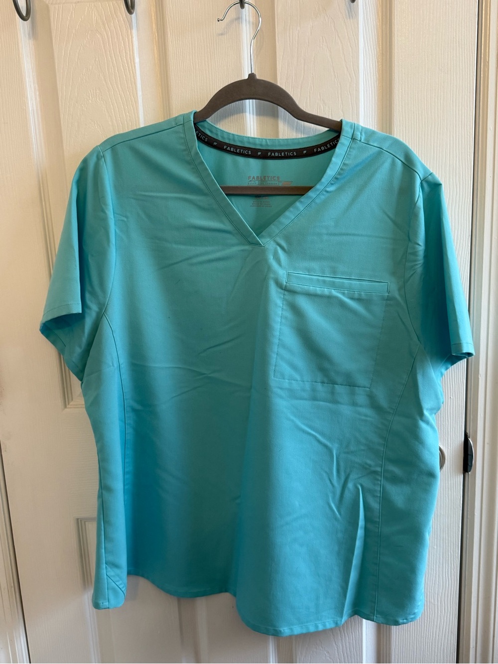 Light blue scrub top